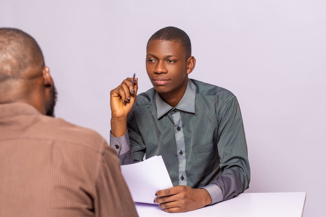 Businessman Interviewing an Applicant